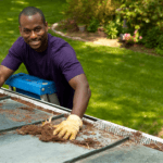 cleaning gutters with a leaf guard installed
